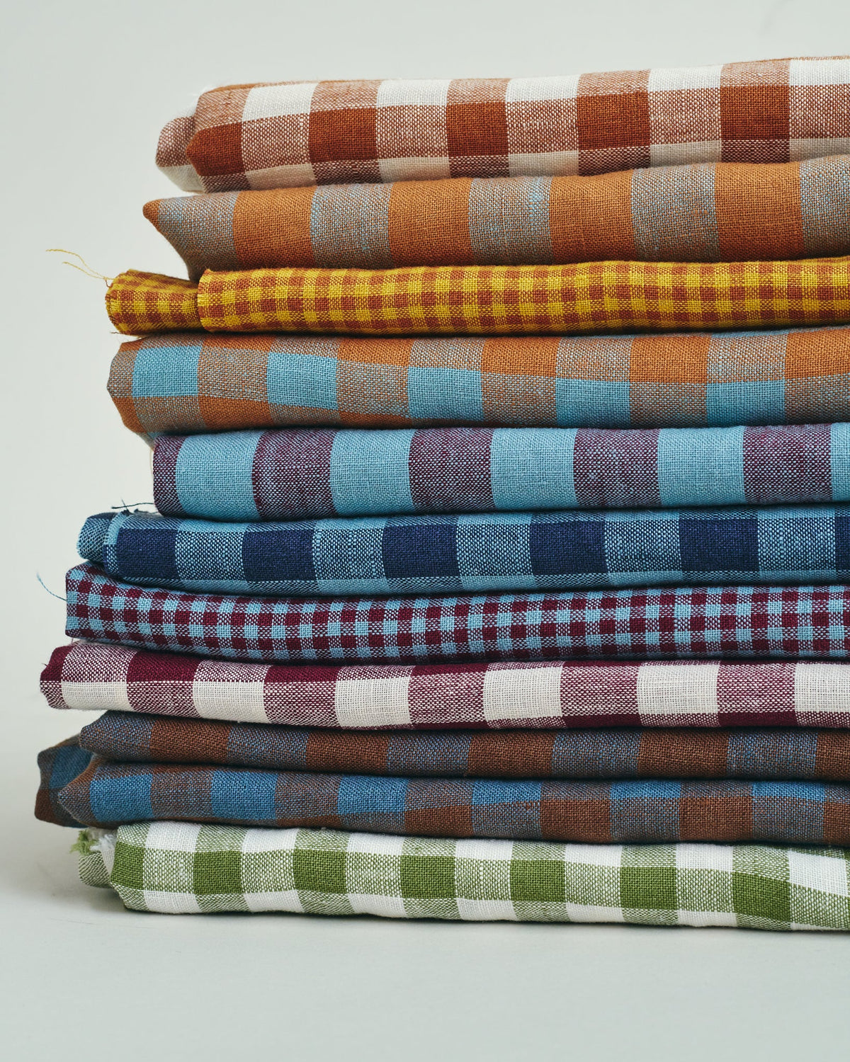 custom designed linen flax fabric for garments in classic patterns like stripes, ginghams and checks
